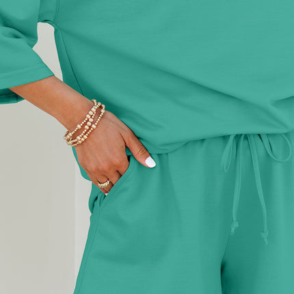 Meadow Mist Green Solid Loose V Neck Half Sleeve Tee and Shorts Set