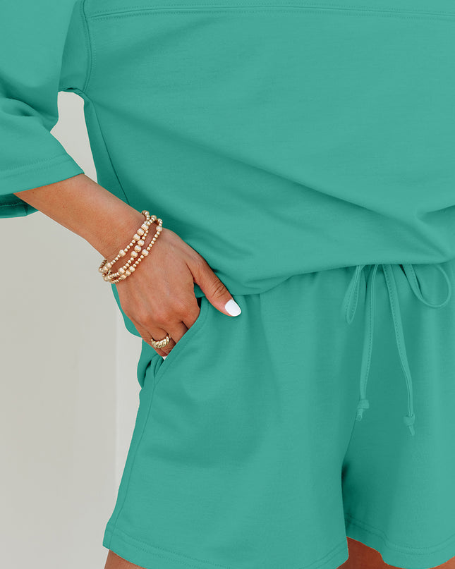 Meadow Mist Green Solid Loose V Neck Half Sleeve Tee and Shorts Set