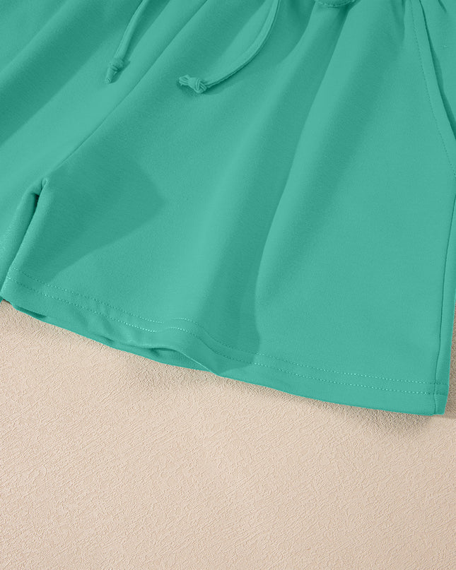 Meadow Mist Green Solid Loose V Neck Half Sleeve Tee and Shorts Set