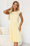 311-21 LILA Classic pleated dress with short sleeves and a belt - butter yellow