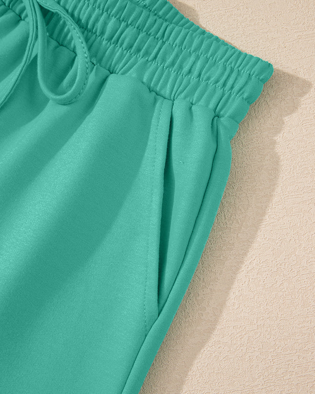 Meadow Mist Green Solid Loose V Neck Half Sleeve Tee and Shorts Set