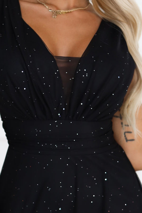 637-2 Long evening dress with a glitter accent and a deep neckline - black