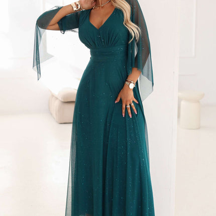 655-2 A long, shimmering dress with a plunging neckline and sheer sleeves - emerald green