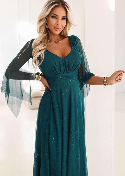 655-2 A long, shimmering dress with a plunging neckline and sheer sleeves - emerald green