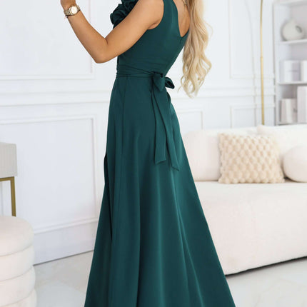 669-1 Romantic maxi dress with a flower on the shoulder and a slit - bottle green