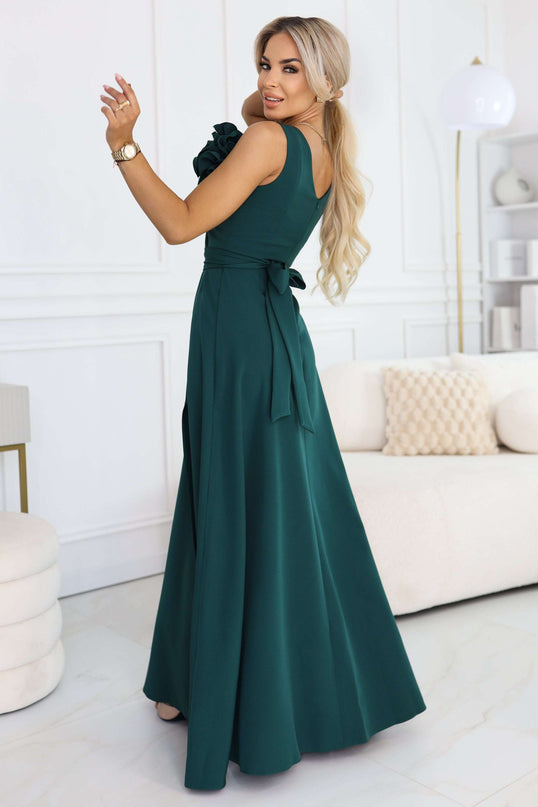 669-1 Romantic maxi dress with a flower on the shoulder and a slit - bottle green