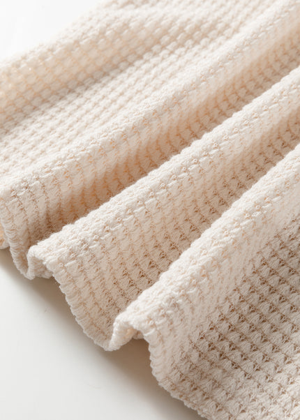 Jet Stream Solid Color Textured Knit Asymmetric Shoulder Long Sleeve Top