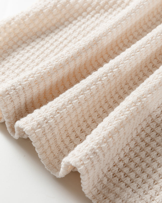 Jet Stream Solid Color Textured Knit Asymmetric Shoulder Long Sleeve Top