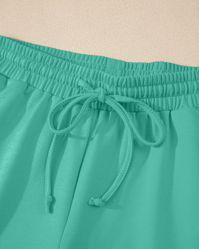Meadow Mist Green Solid Loose V Neck Half Sleeve Tee and Shorts Set