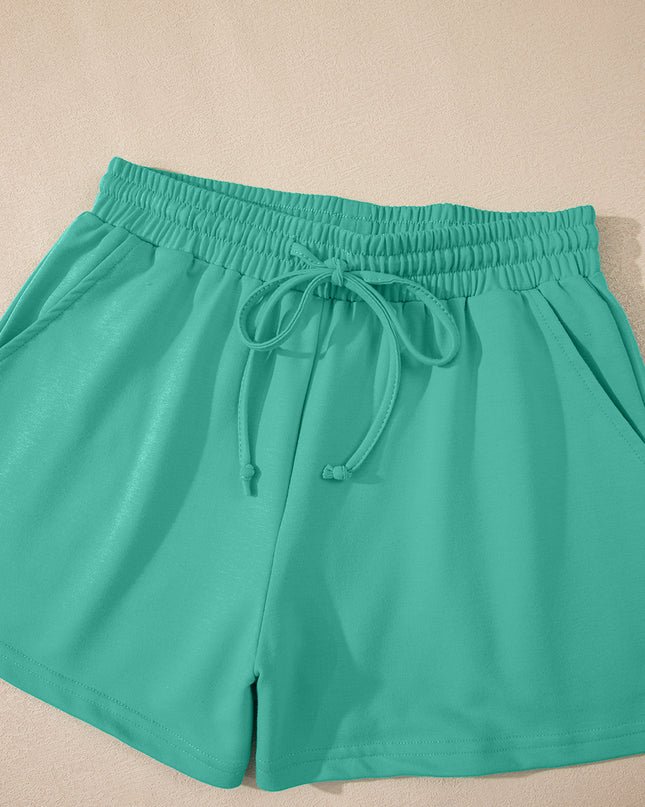Meadow Mist Green Solid Loose V Neck Half Sleeve Tee and Shorts Set