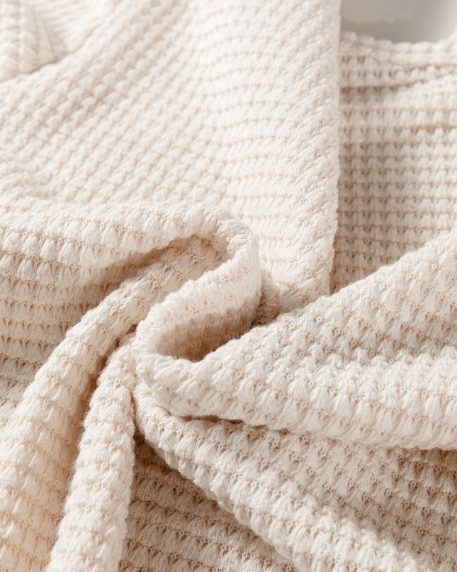 Jet Stream Solid Color Textured Knit Asymmetric Shoulder Long Sleeve Top